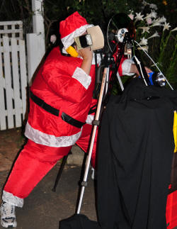 Santa adjusts the camera